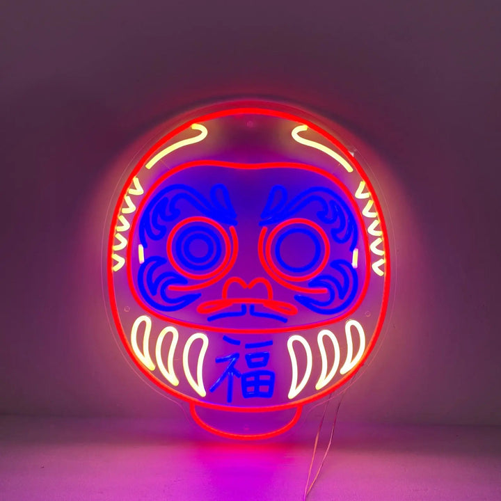 neon poupée daruma japonaise